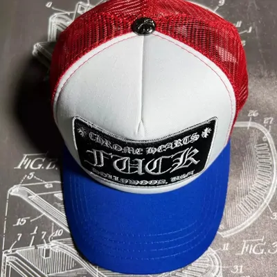 A mesh backed trucker cap in red, white and blue with an embroidered patch across the front panel